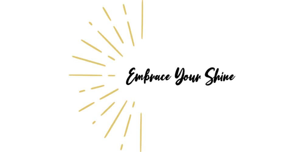Text "Embrace Your Shine" in black script with golden rays extending from the left side, set against a white background.