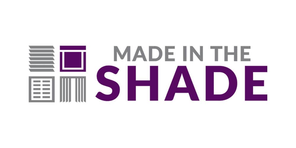 Logo with stylized window blinds and shades graphic on the left, and the text "MADE IN THE SHADE" in gray and purple on the right.